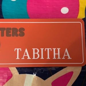 Hooters girl Tabitha name tag